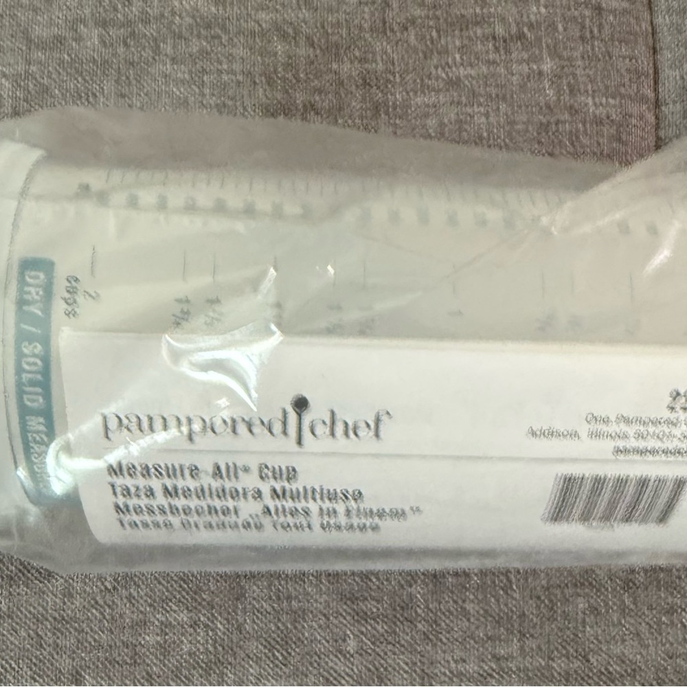 Pampered Chef Multi-Function Measuring Cup and Adjustable Measuring Spoons